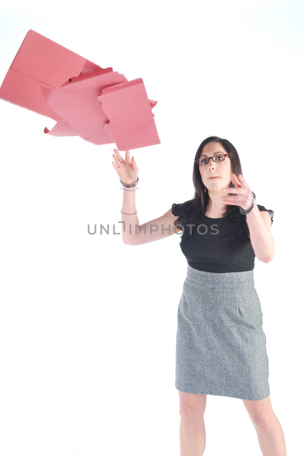 Business woman trhrowing files in air