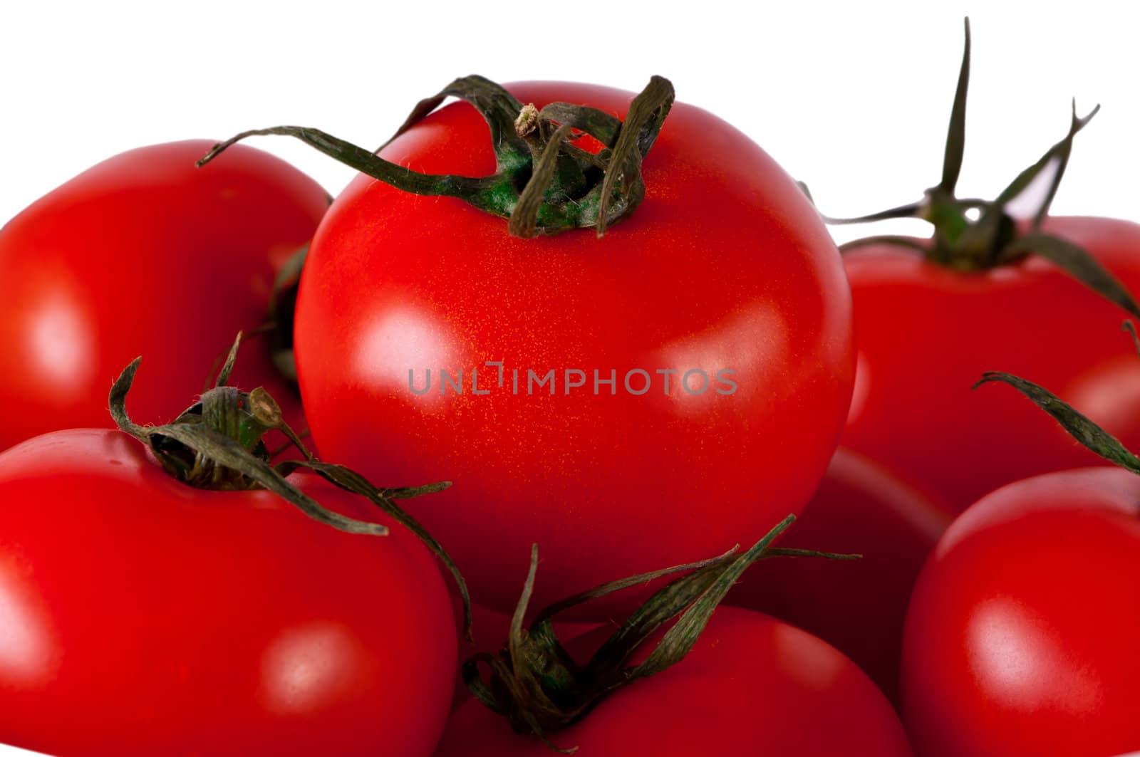 Red tomato isolated on white. Fresh red tomato. Sweet  vegetable.
