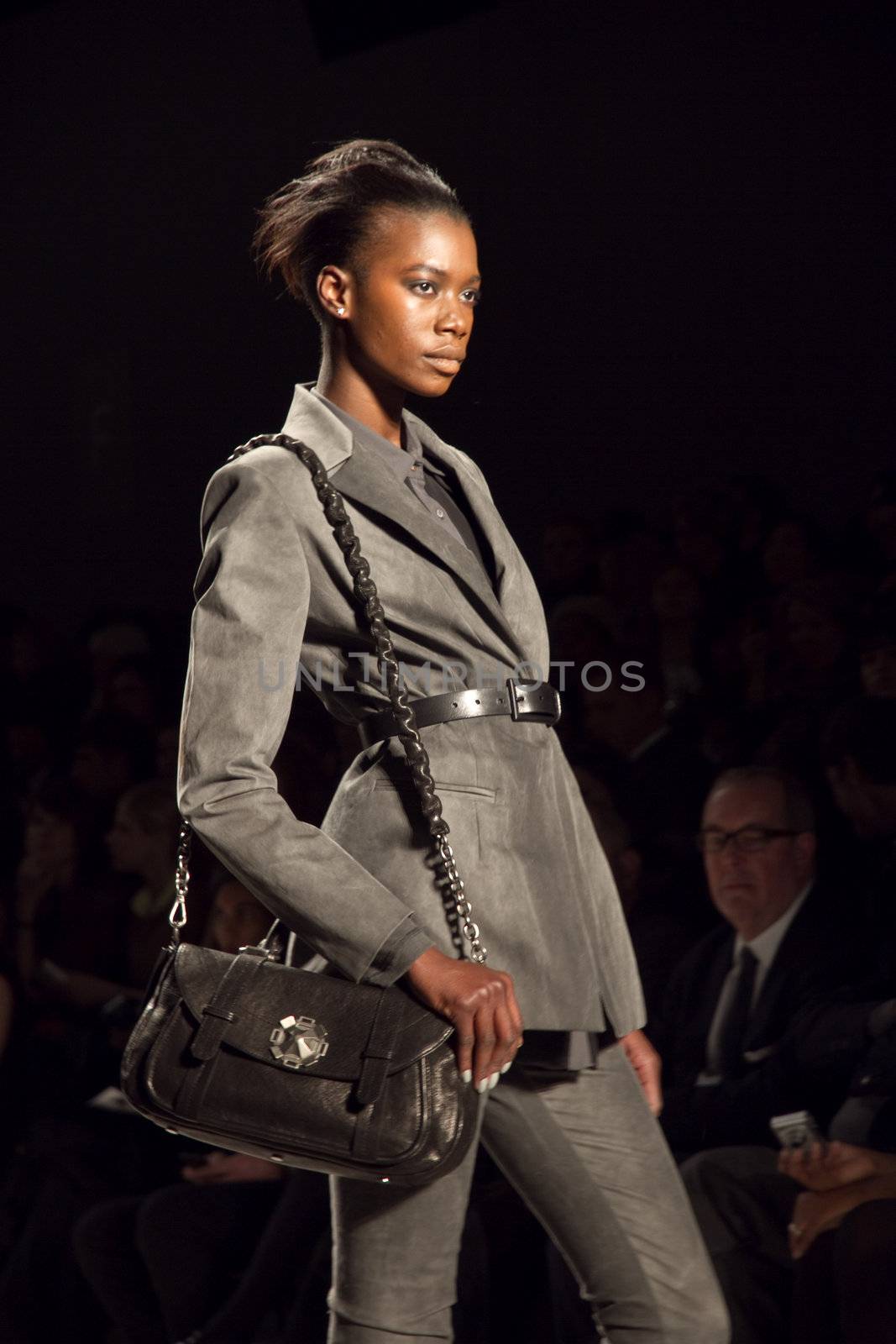 NEW-YORK, NY - FEBRUARY 11: A model walks the runway during the Nicole Miller Ready to Wear Fall/Winter 2011/2012 show at Mercedes-Benz New York Fashion Week on February 11, 2011 in New York, New York. (Photo by Diana Beato)