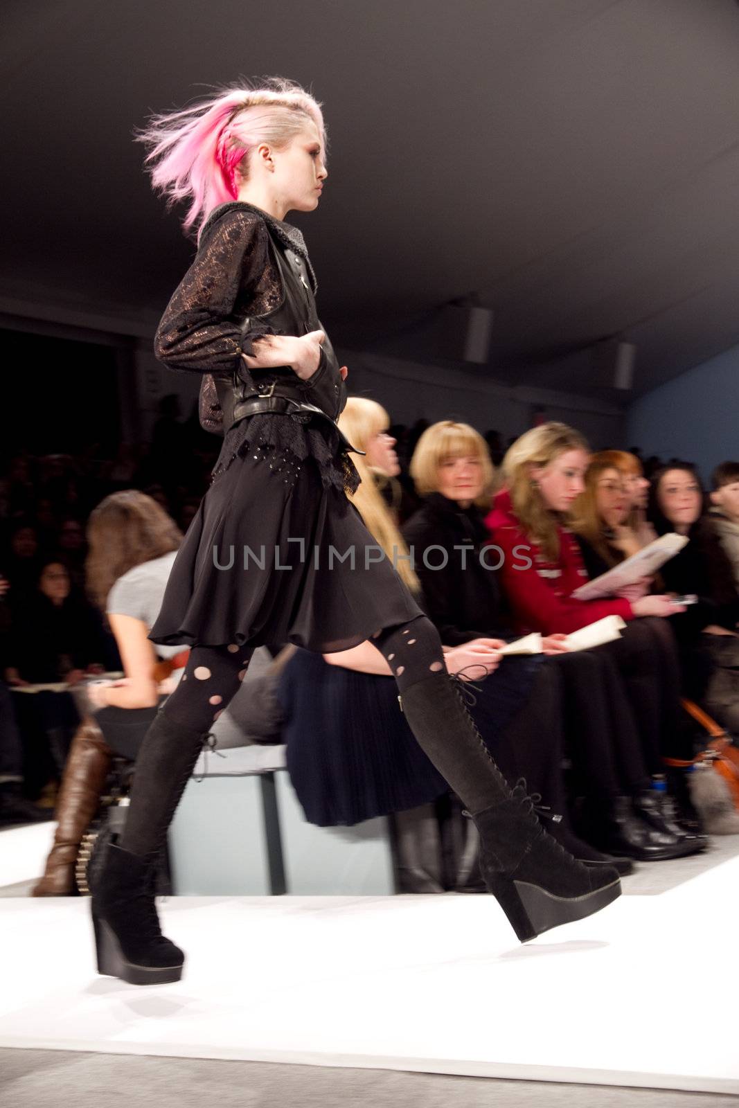 NEW YORK, NY - FEBRUARY 12: A model walks the runway at the Charlotte Ronson Fall 2011 fashion show during Mercedes-Benz Fashion Week at Lincoln Center on February 12, 2011 in New York City. (Photo by Diana Beato)