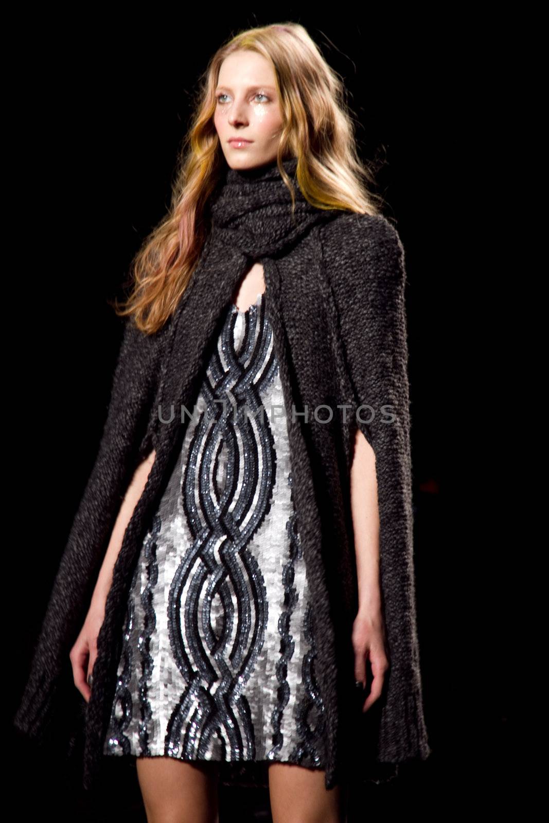 NEW YORK, NY - FEBRUARY 14: A model walks the runway at the Tracy Reese Fall 2011 fashion show during Mercedes-Benz Fashion Week at The Studio at Lincoln Center on February 14, 2011 in New York City. (Photo by Diana Beato)