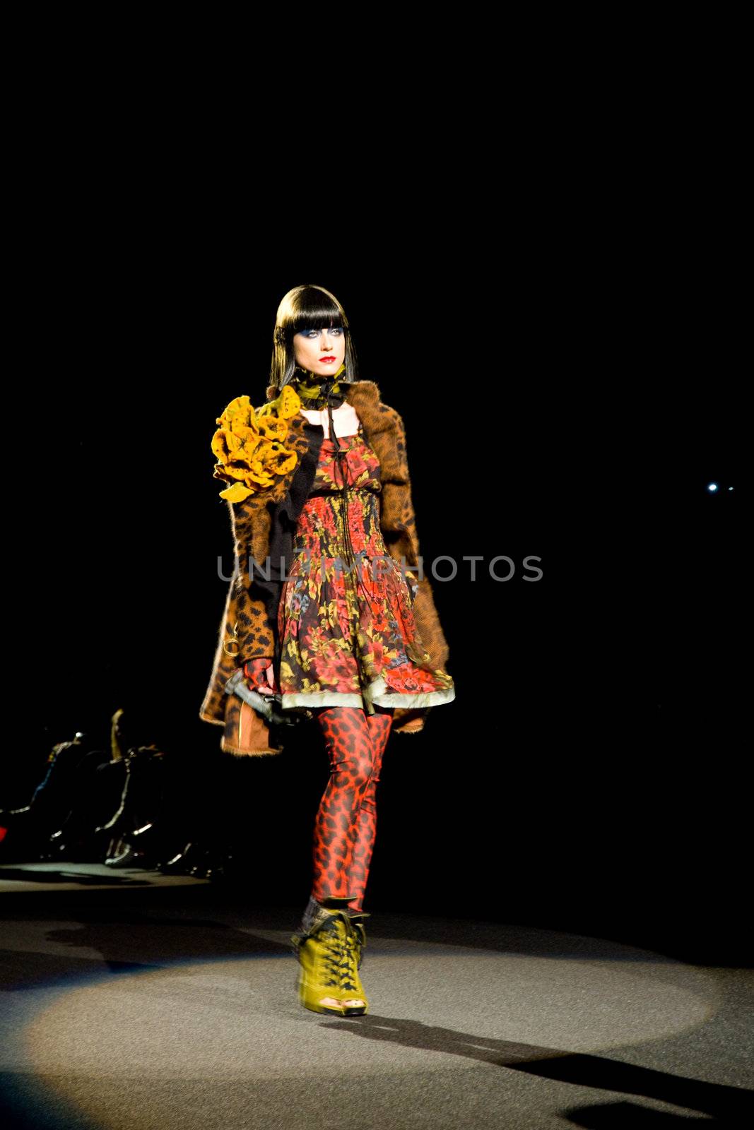 NEW YORK, NY - FEBRUARY 14: A model walks the runway at the Betsey Johnson Fall 2011 fashion show during Mercedes-Benz Fashion Week at The Theatre at Lincoln Center on February 14, 2011 in New York City. (Photo by Diana Beato)