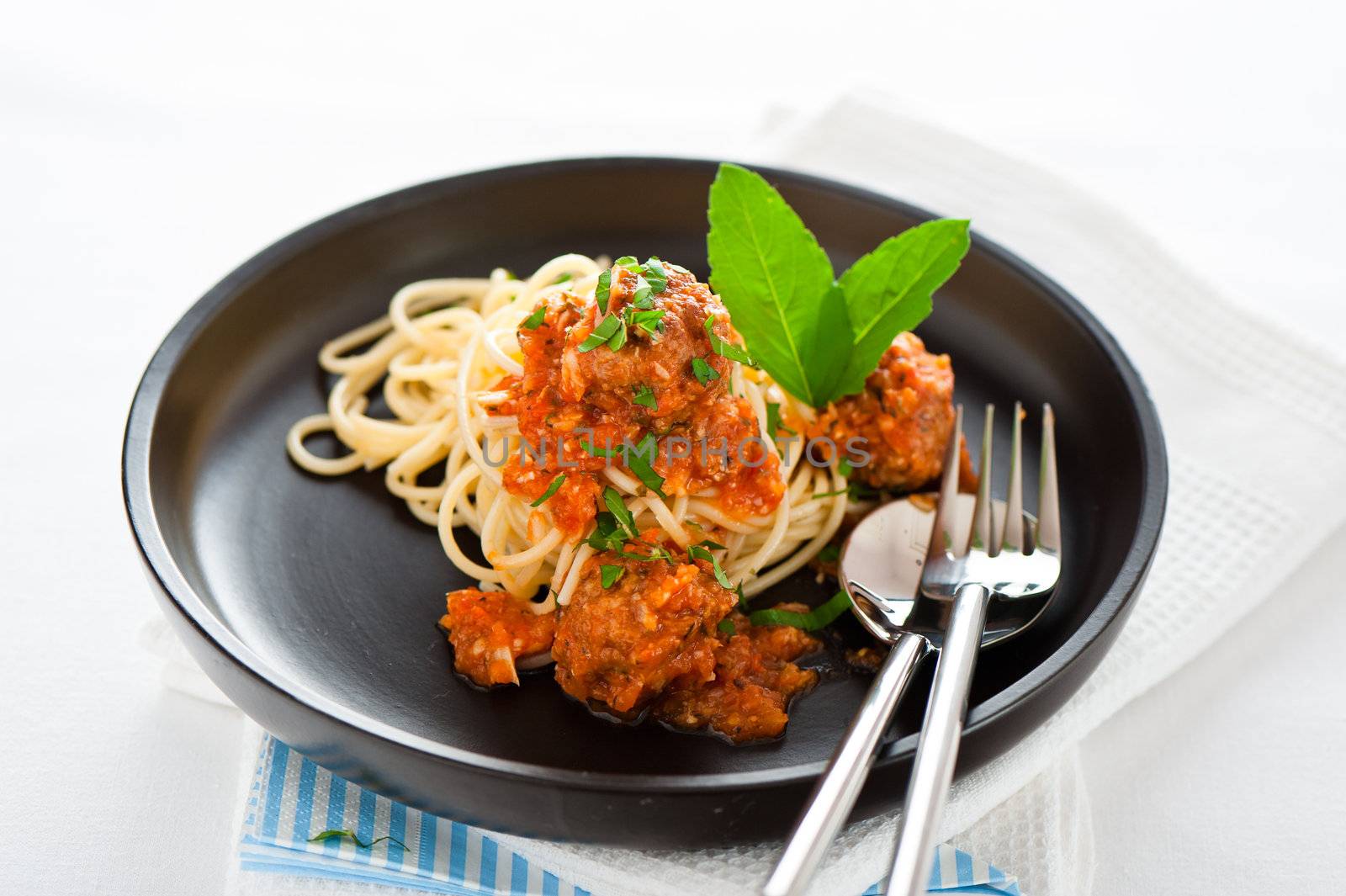 Original Italian spaghetti with meatballs in tomato sauce