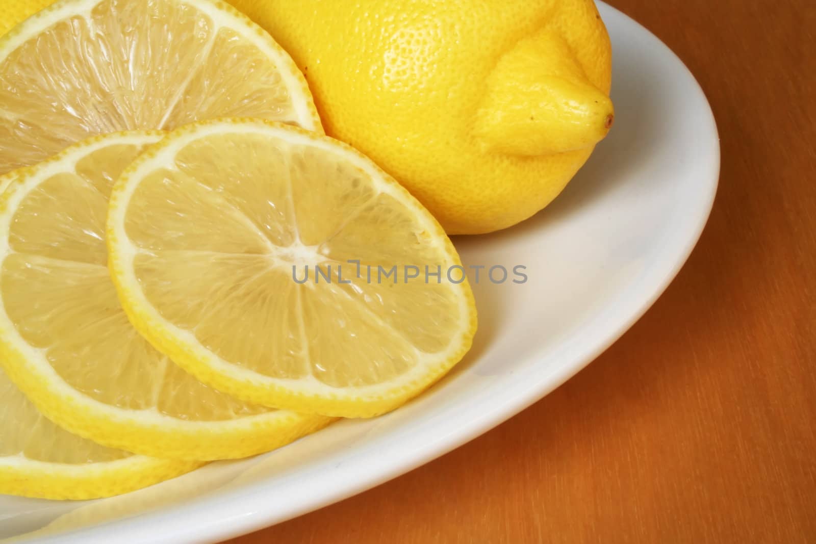 Fresh lemons on the plate