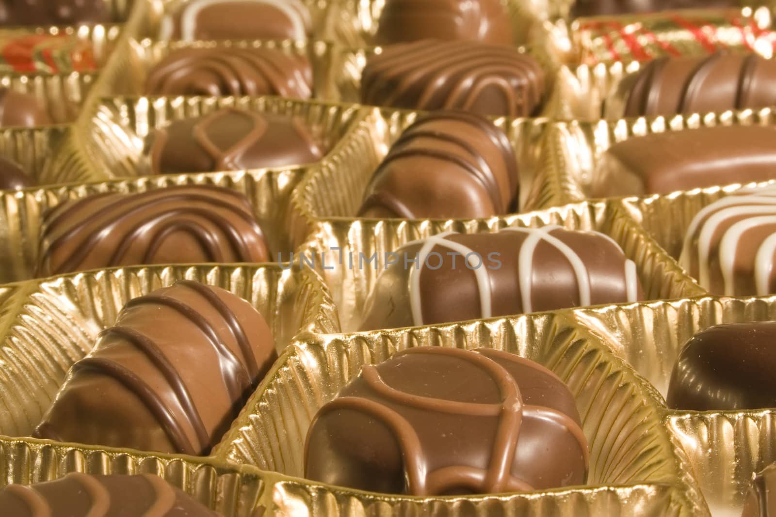 Chocolate candies in a golden box