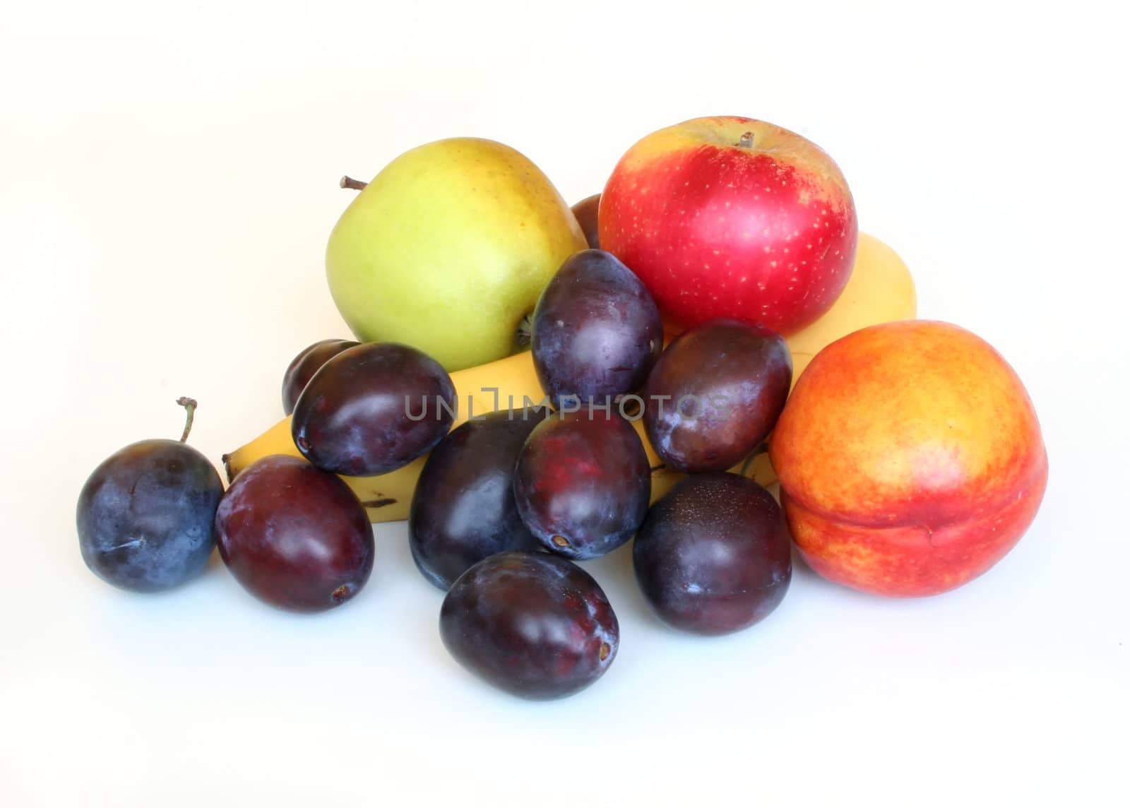 Various fruits on white background