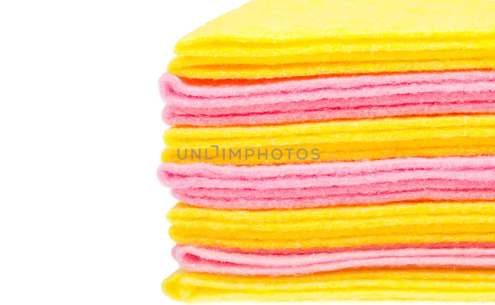 close-up stack of rags with blank place, isolated on white