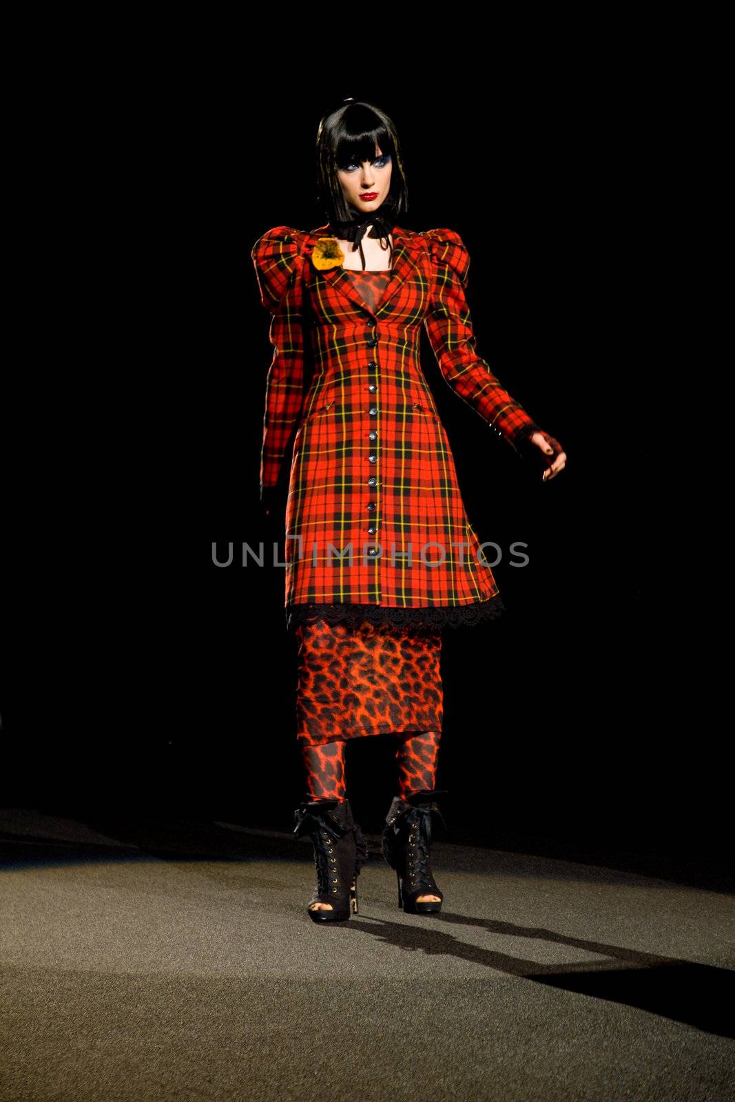 NEW YORK, NY - FEBRUARY 14: A model walks the runway at the Betsey Johnson Fall 2011 fashion show during Mercedes-Benz Fashion Week at The Theatre at Lincoln Center on February 14, 2011 in New York City. (Photo by Diana Beato)