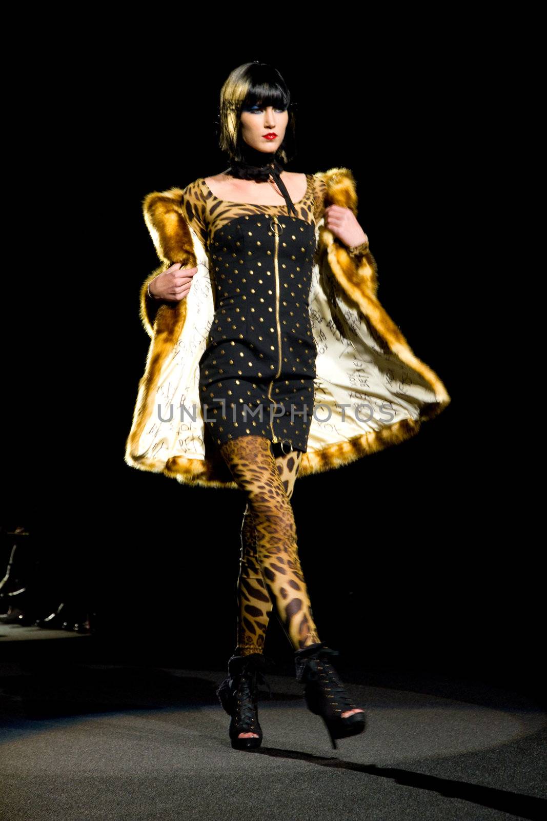 NEW YORK, NY - FEBRUARY 14: A model walks the runway at the Betsey Johnson Fall 2011 fashion show during Mercedes-Benz Fashion Week at The Theatre at Lincoln Center on February 14, 2011 in New York City. (Photo by Diana Beato)