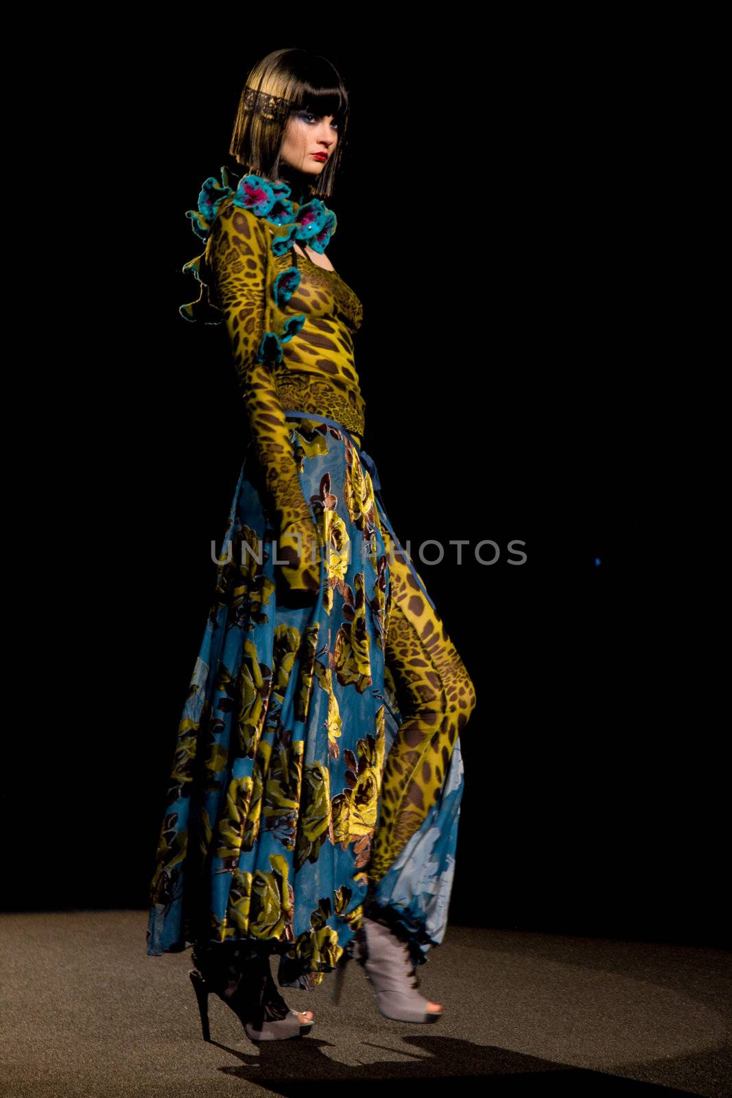 NEW YORK, NY - FEBRUARY 14: A model walks the runway at the Betsey Johnson Fall 2011 fashion show during Mercedes-Benz Fashion Week at The Theatre at Lincoln Center on February 14, 2011 in New York City. (Photo by Diana Beato)