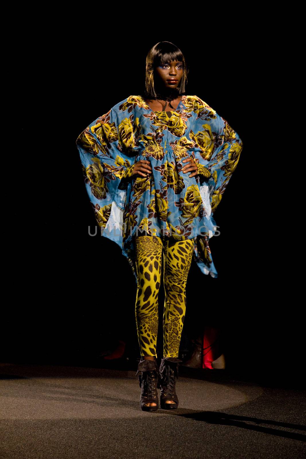 NEW YORK, NY - FEBRUARY 14: A model walks the runway at the Betsey Johnson Fall 2011 fashion show during Mercedes-Benz Fashion Week at The Theatre at Lincoln Center on February 14, 2011 in New York City. (Photo by Diana Beato)