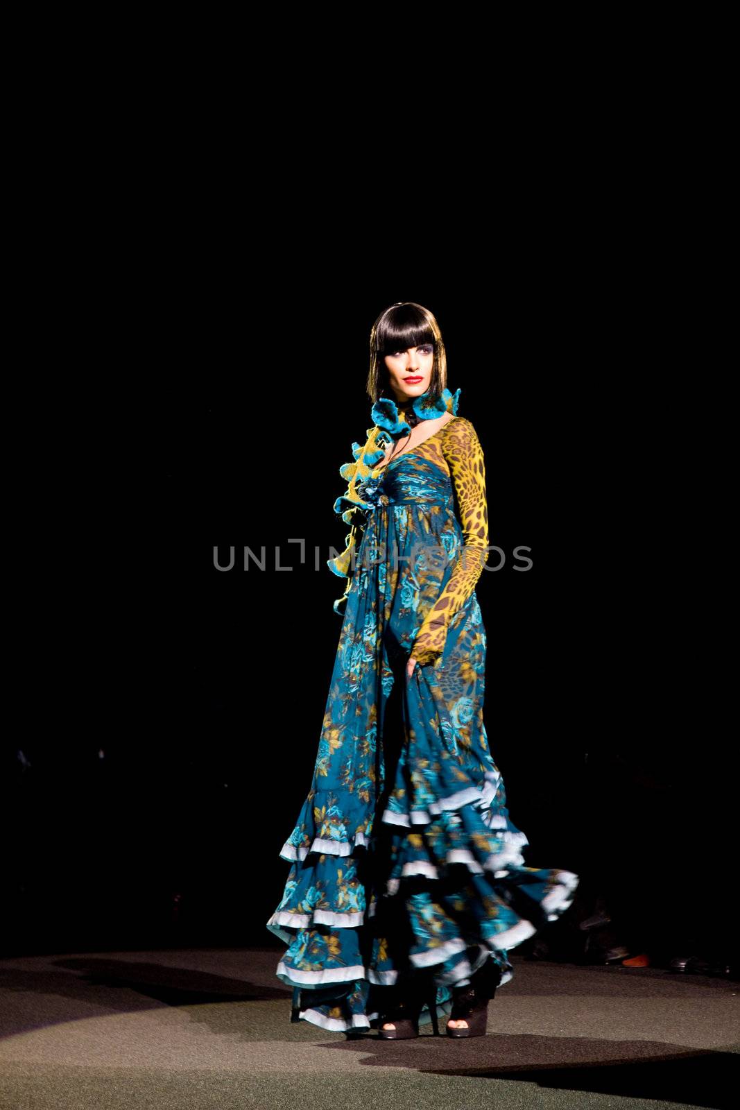 NEW YORK, NY - FEBRUARY 14: A model walks the runway at the Betsey Johnson Fall 2011 fashion show during Mercedes-Benz Fashion Week at The Theatre at Lincoln Center on February 14, 2011 in New York City. (Photo by Diana Beato)