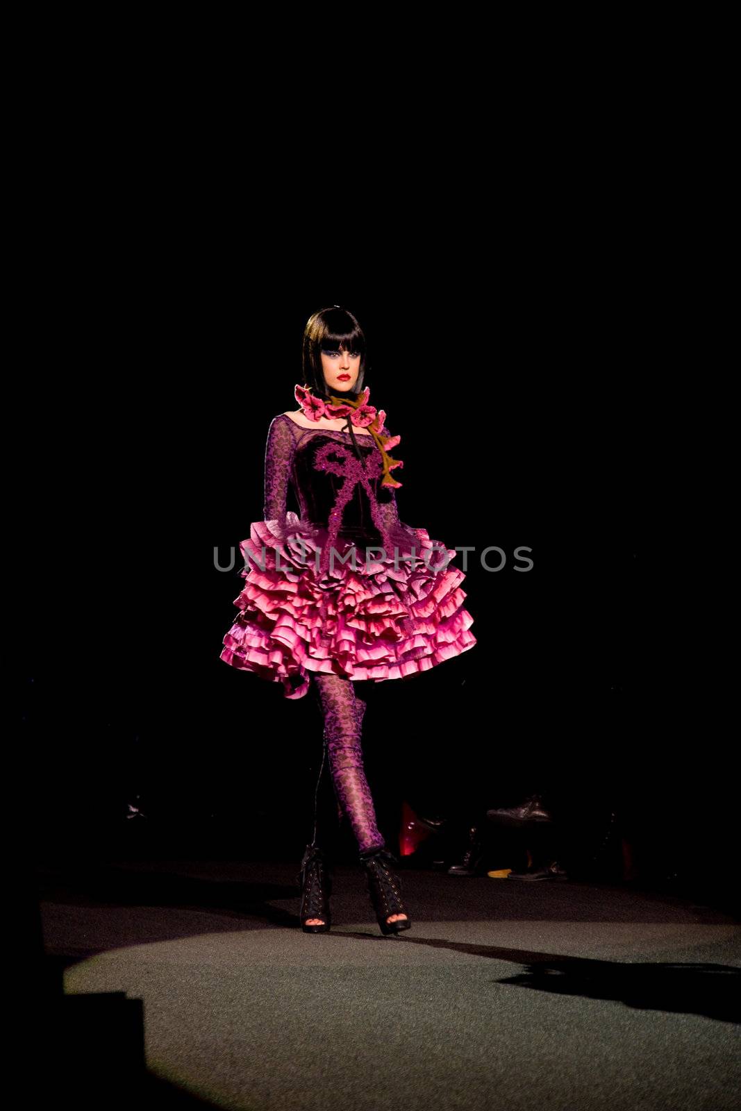 NEW YORK, NY - FEBRUARY 14: A model walks the runway at the Betsey Johnson Fall 2011 fashion show during Mercedes-Benz Fashion Week at The Theatre at Lincoln Center on February 14, 2011 in New York City. (Photo by Diana Beato)