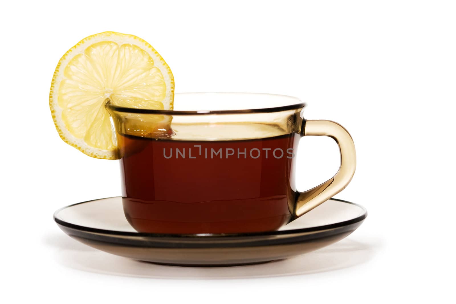 Cup of tea with lemon isolated on a white background