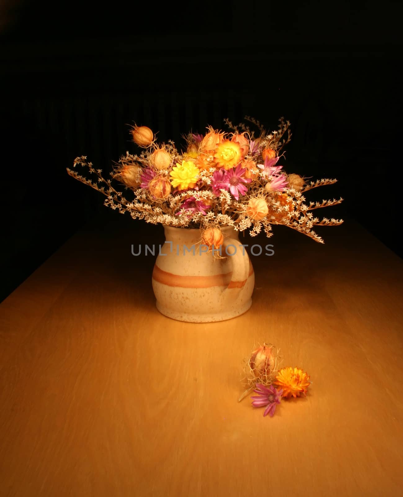 Bunch of everlasting flowers - dark still-life