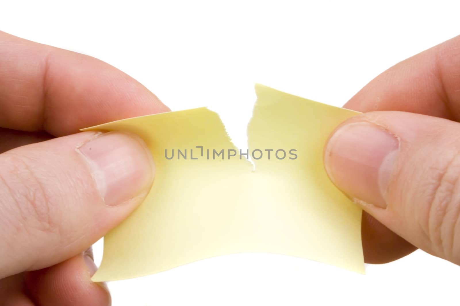 Tearing yellow paper by orson