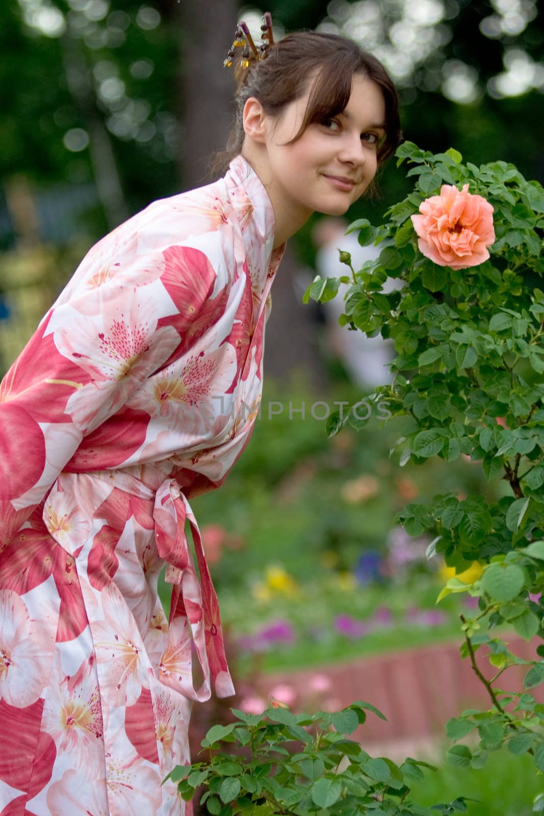 Girl in a pink yukata with rose
