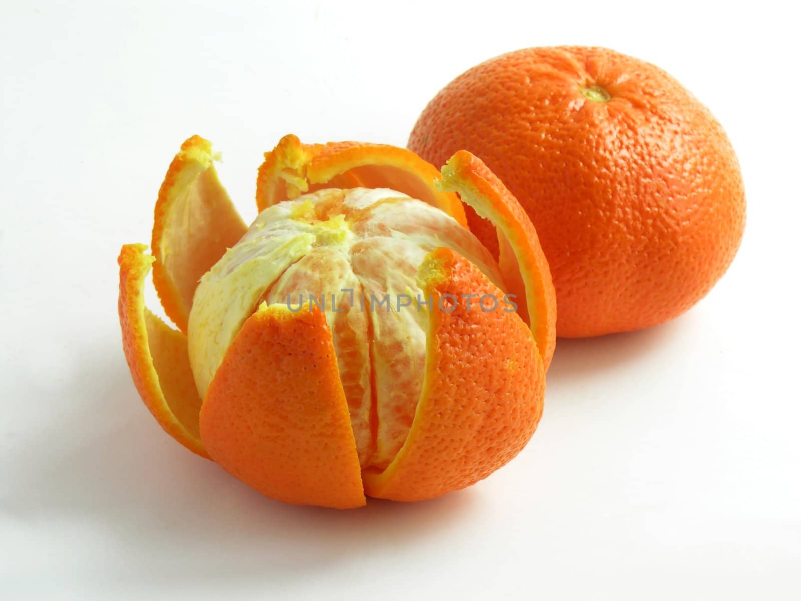 two sweet juicy mandarines by RAIMA