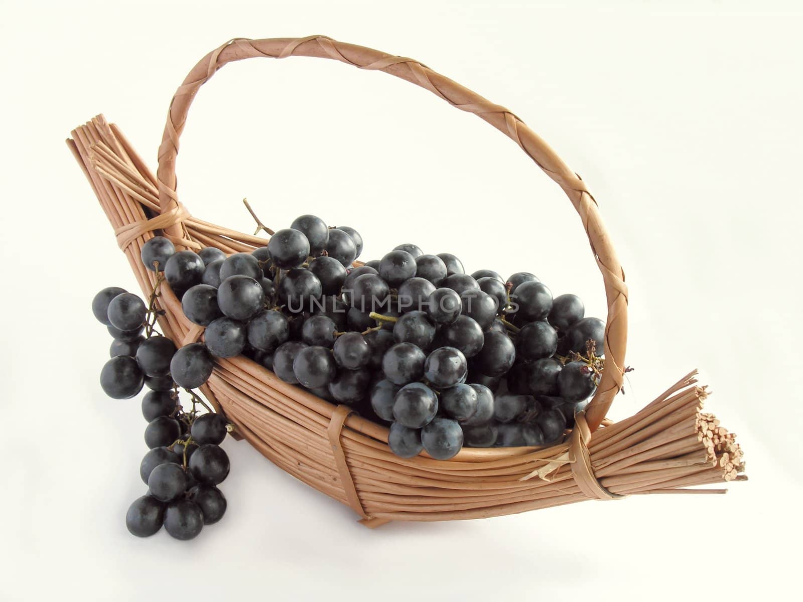 red grapes in basket by RAIMA