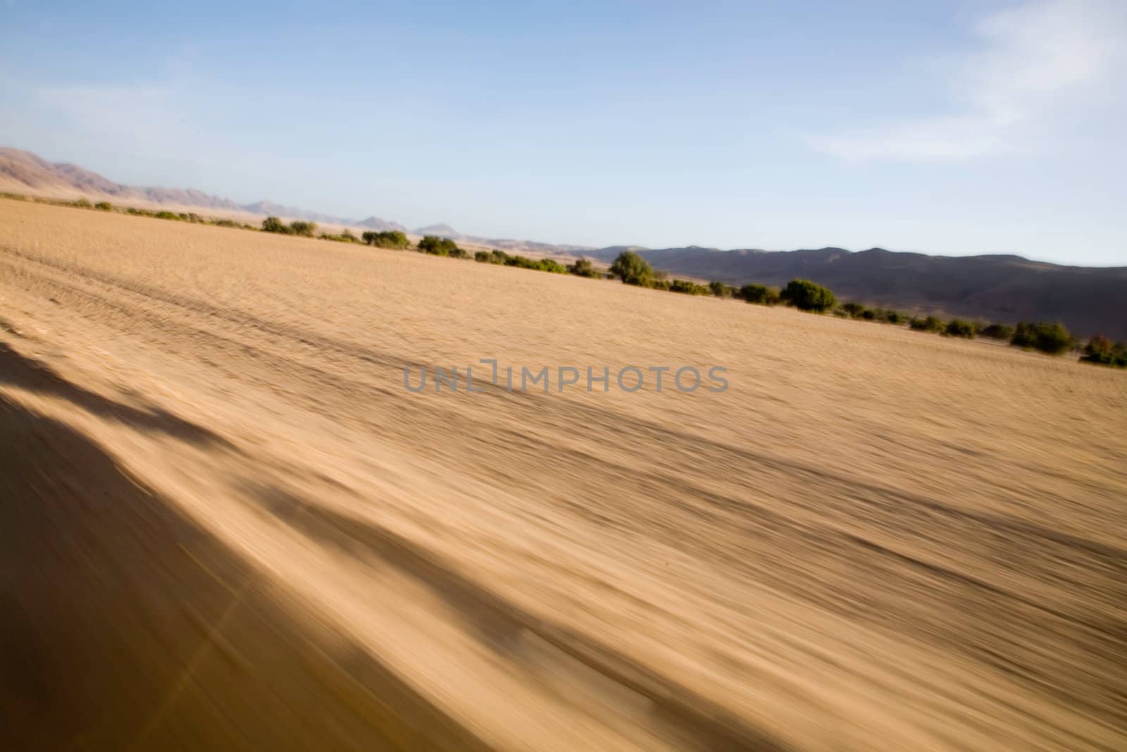 Driving a 4x4 at full speed in the sand in Namibia