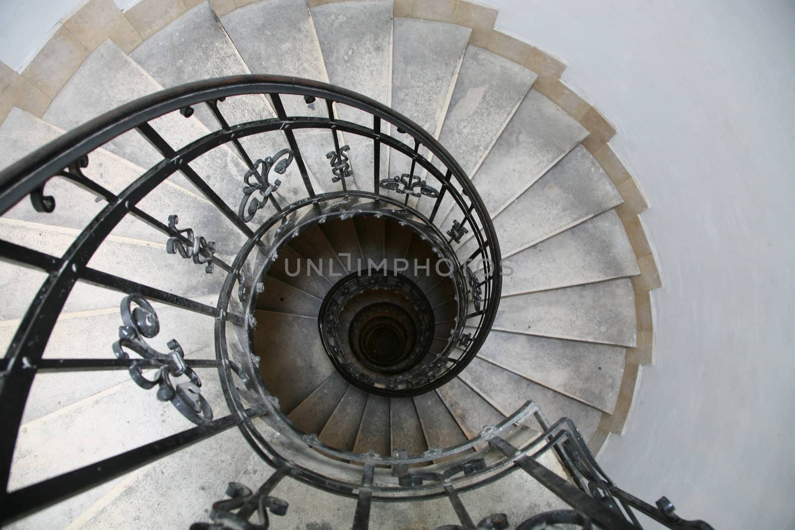 Spiral staircase, lit from above in  Budapest