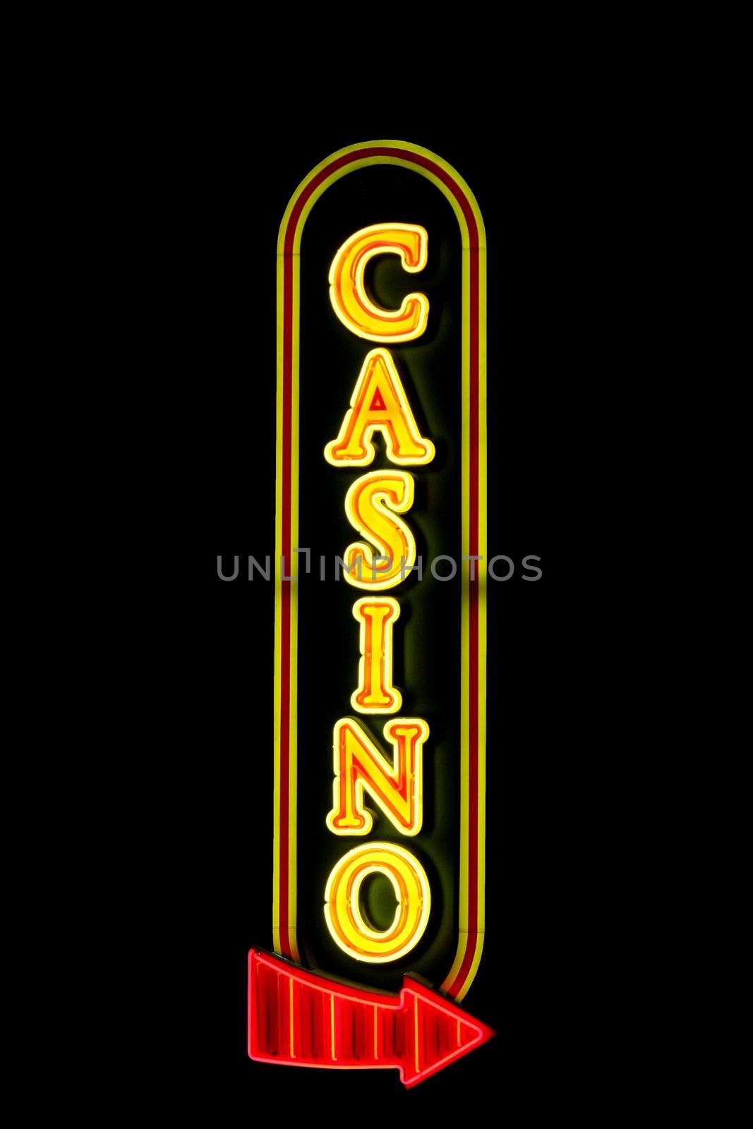 Casino sign with a red arrow in neon lights isolated on black