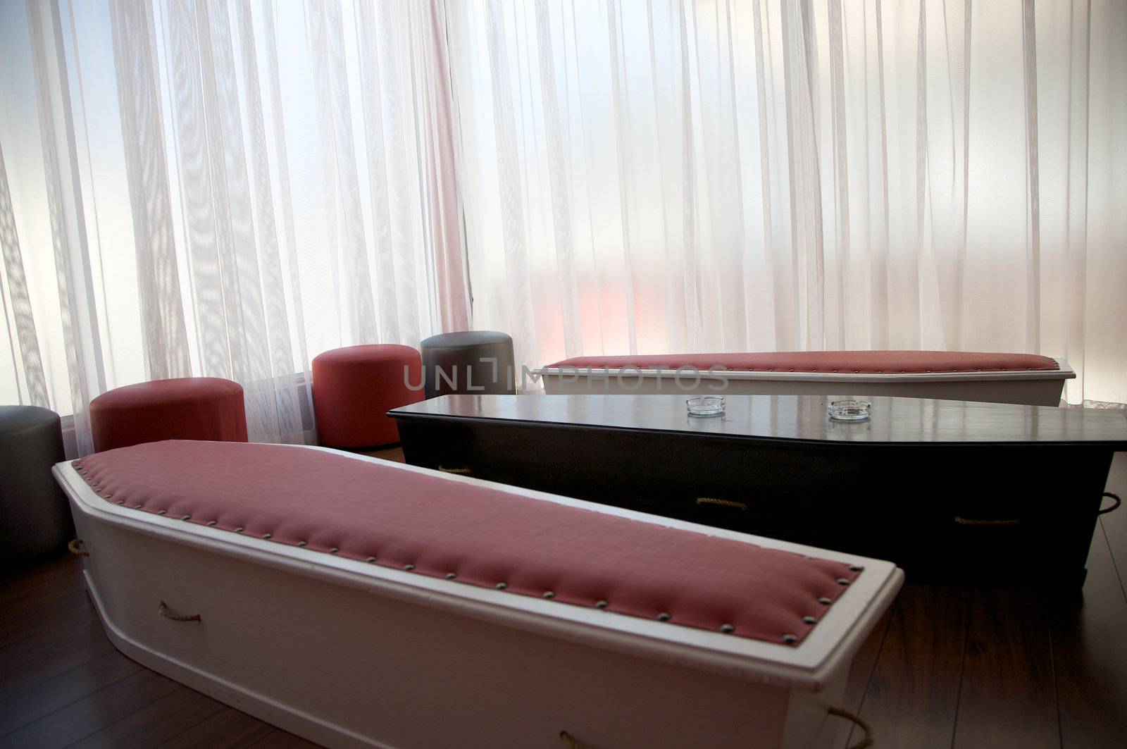 coffin in a smoking room
