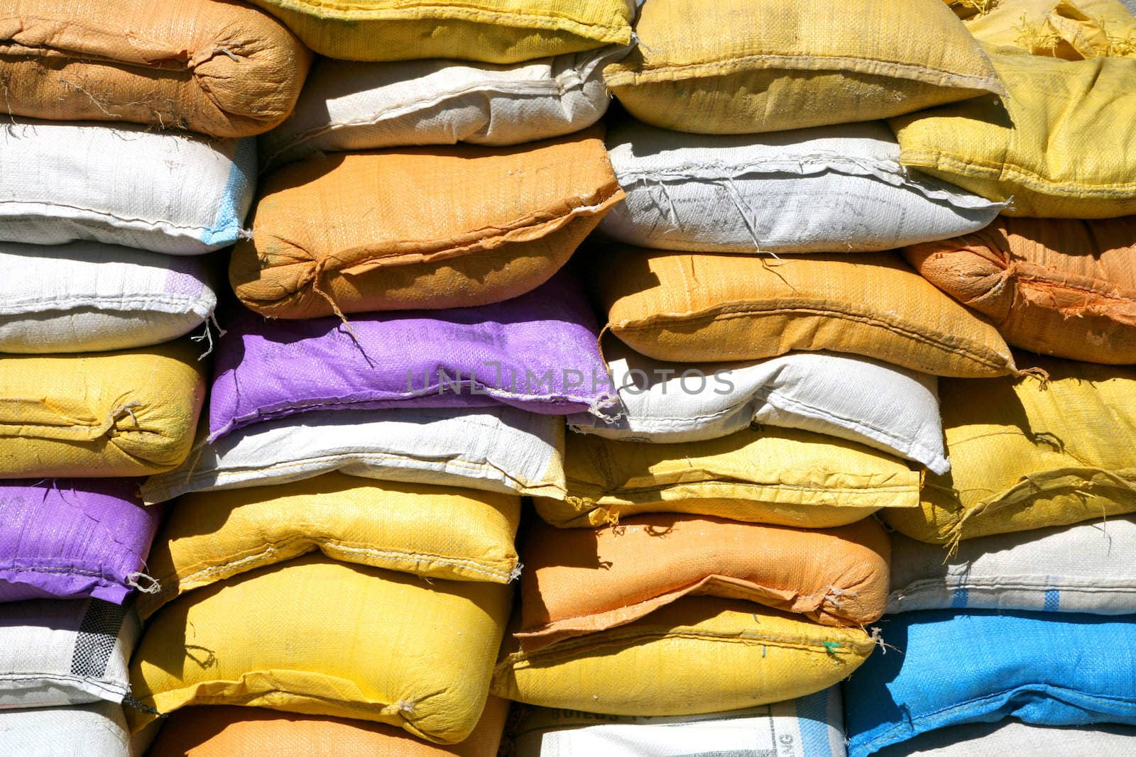 Colored sand bags by watchtheworld