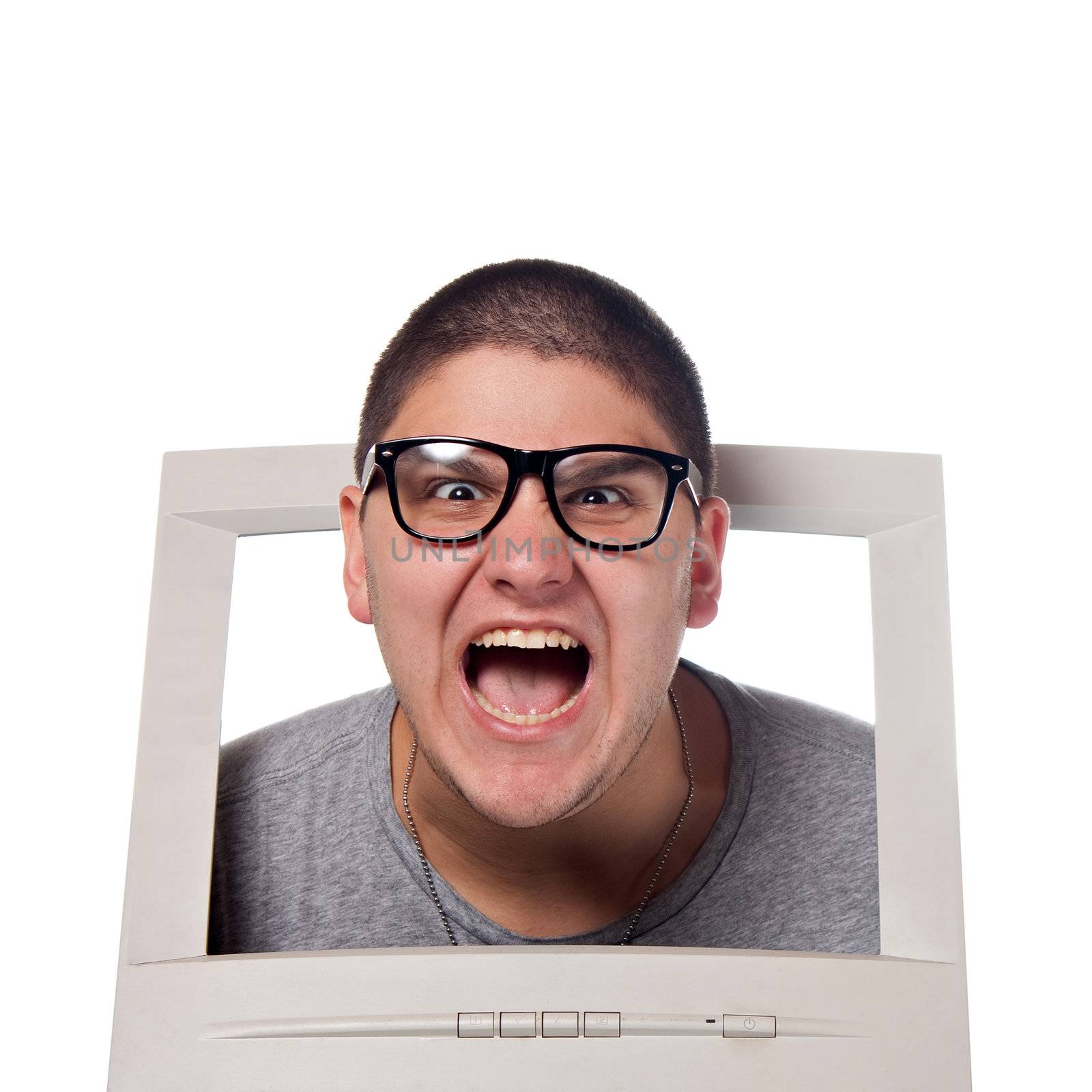 A young man popping his head out of a computer monitor with nerd glasses.