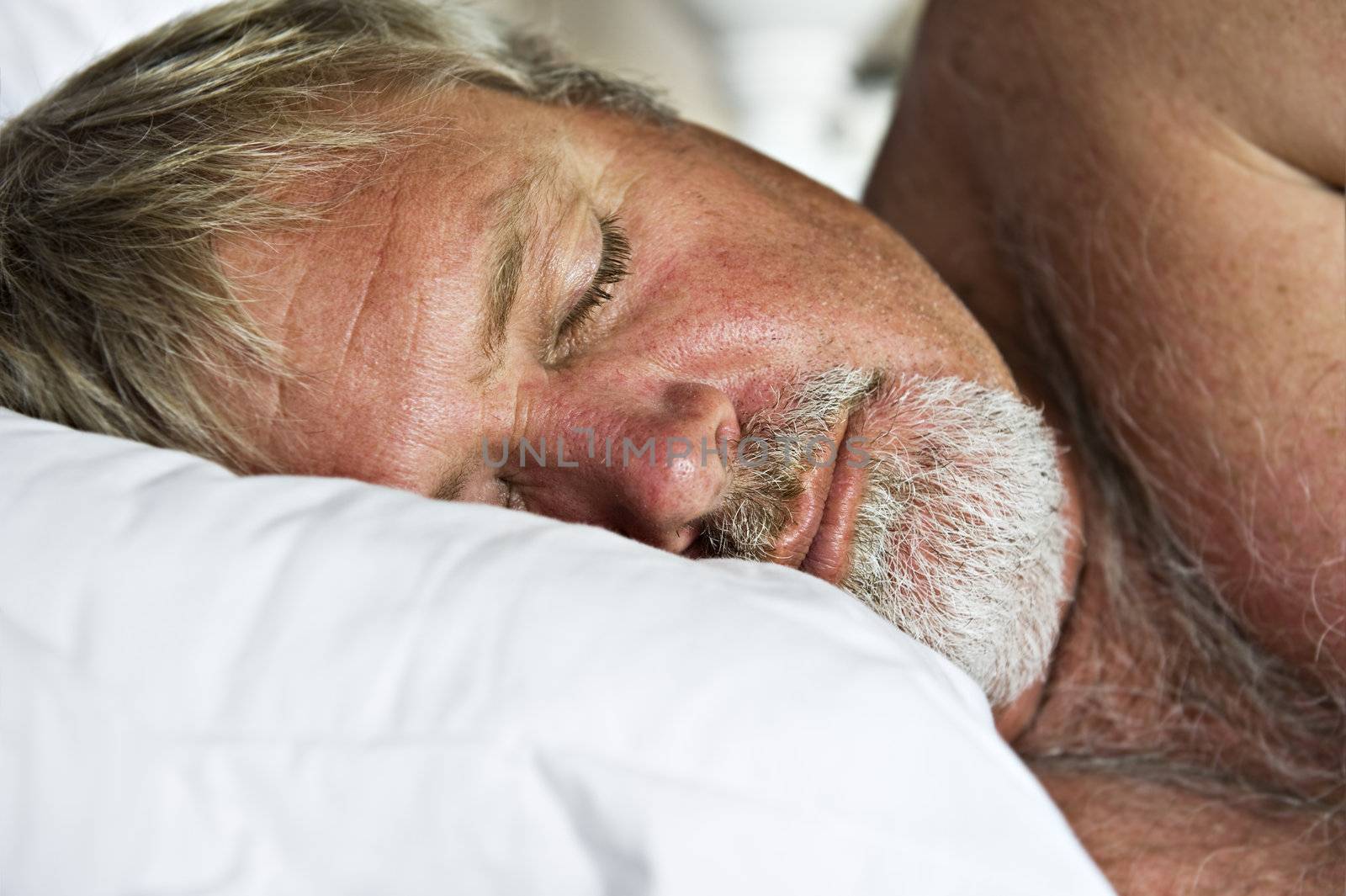 Mature senior man sleeping peacefully