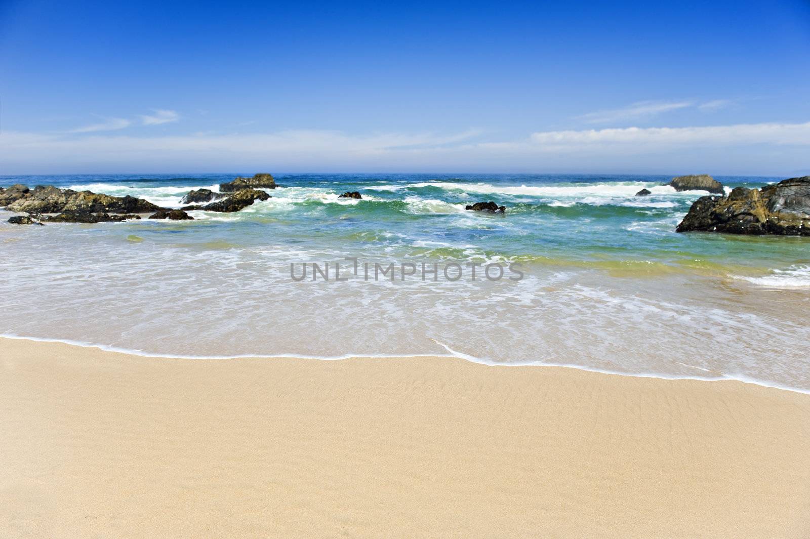 Beautiful beach on a tropical island - shallow depth of field by tish1