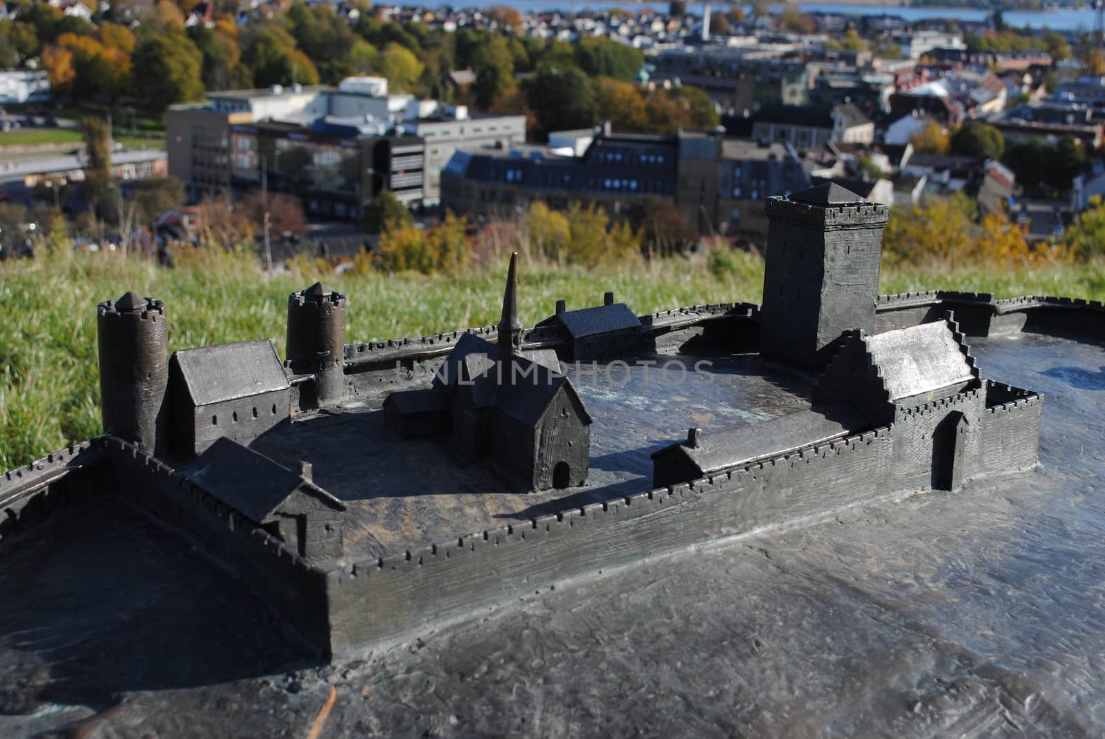 An outdoor bronze model of Tønsberg Fortress (Tunsberg festning), a medieval fortress, located in Tønsberg, Norway which was defended by the fortress for over 300 years.