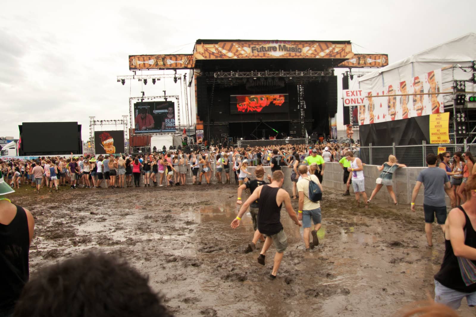 People dancing in the mud at the Future Musical Festival 2011 at Brisbane Australia.