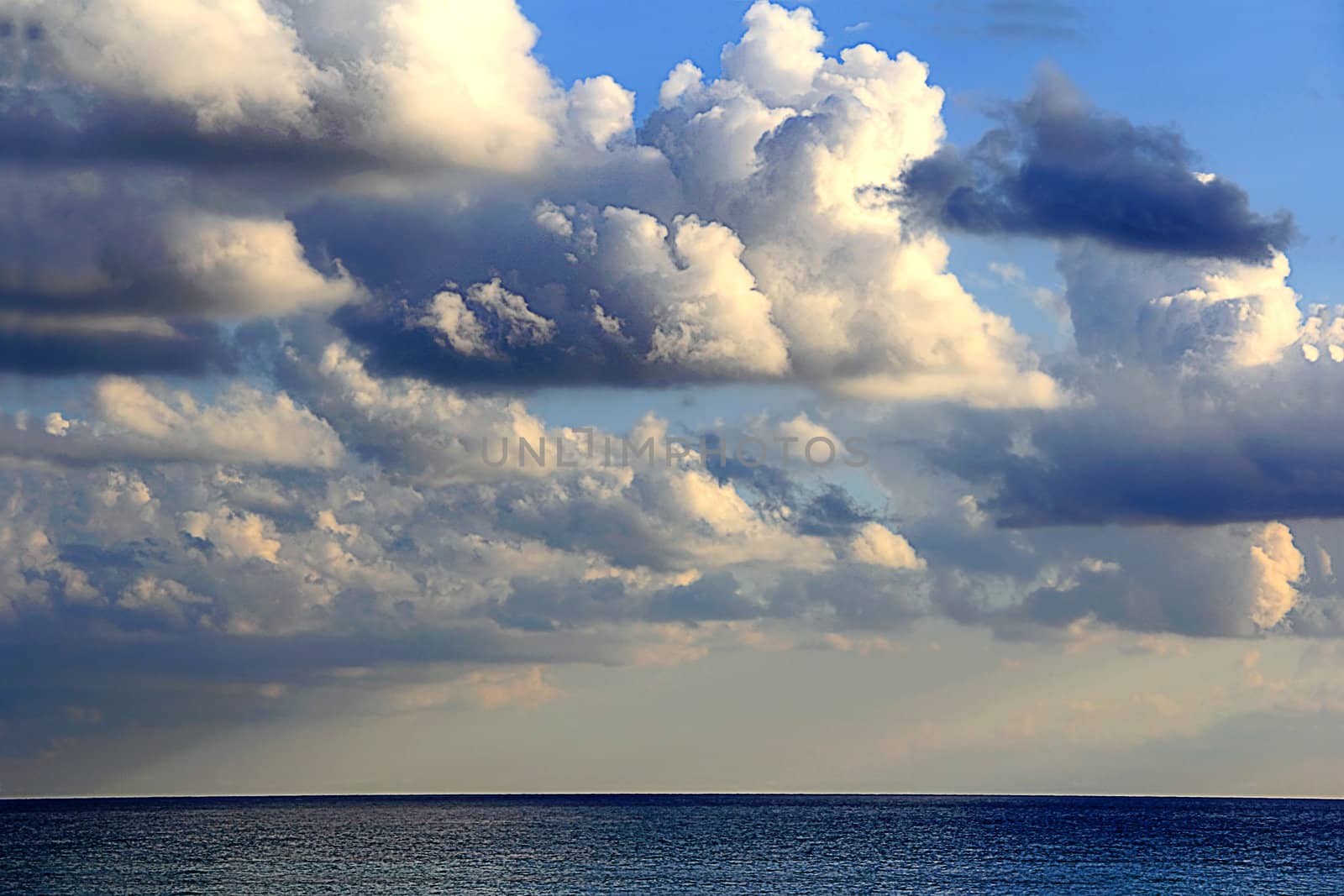 Landscape with calm sea and cloudiness sky