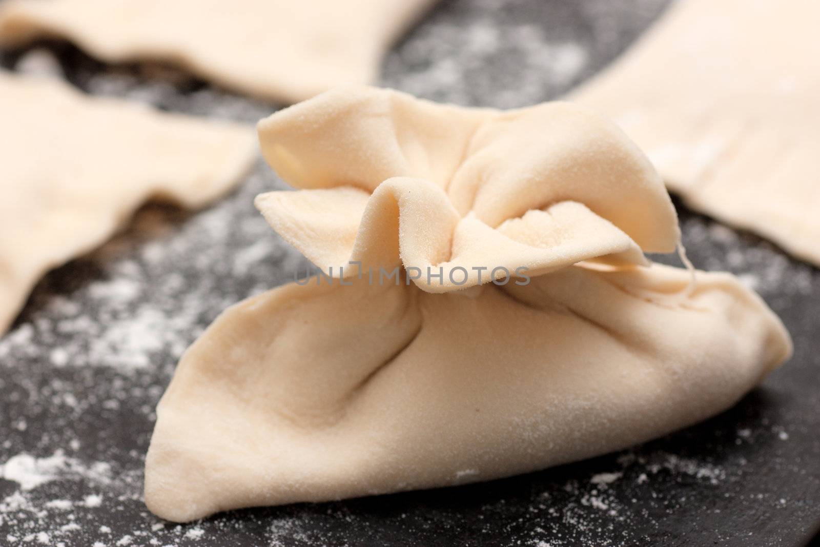 Raw pastry on a baking tray