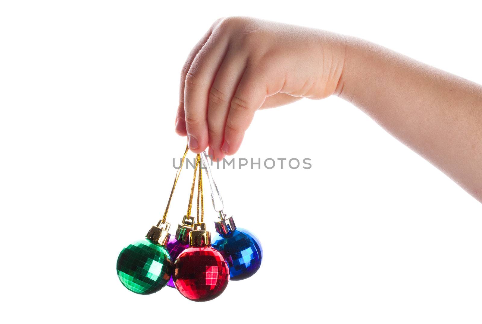 close-up christmas decoration in hand, isolated on white