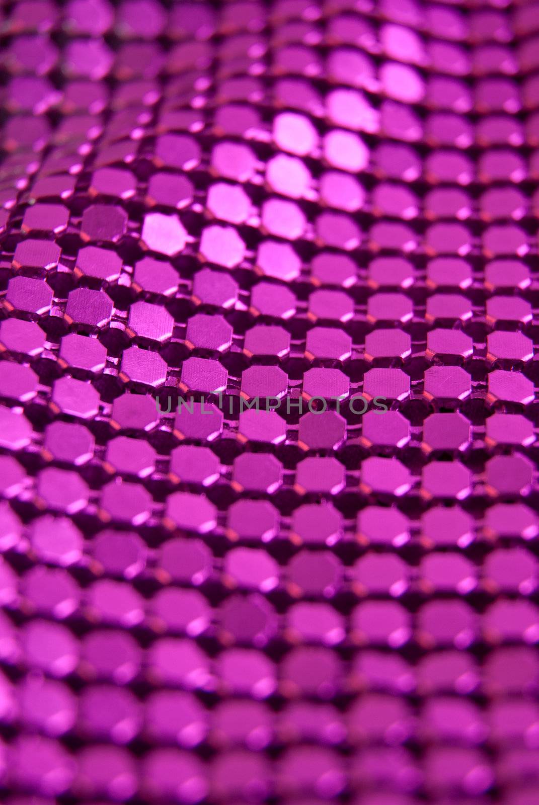 Abstract reflective background of circle pattern mesh.