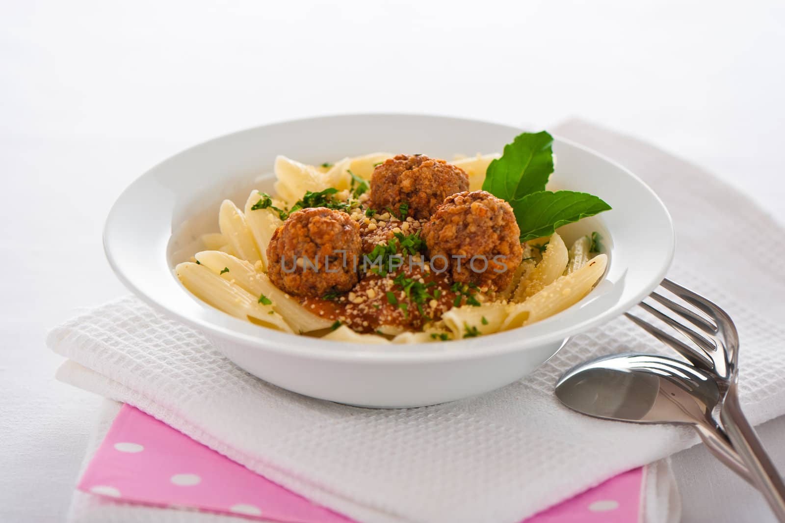 Pasta with tomato garlic sauce and meatballs