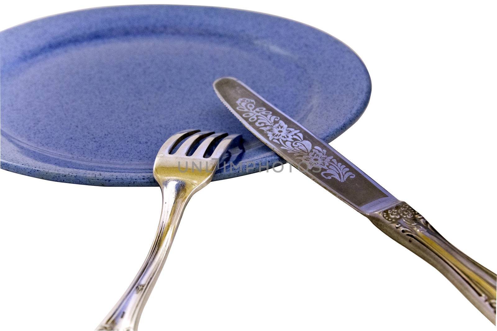 contour, silhouette, profile fork knife on blue plate