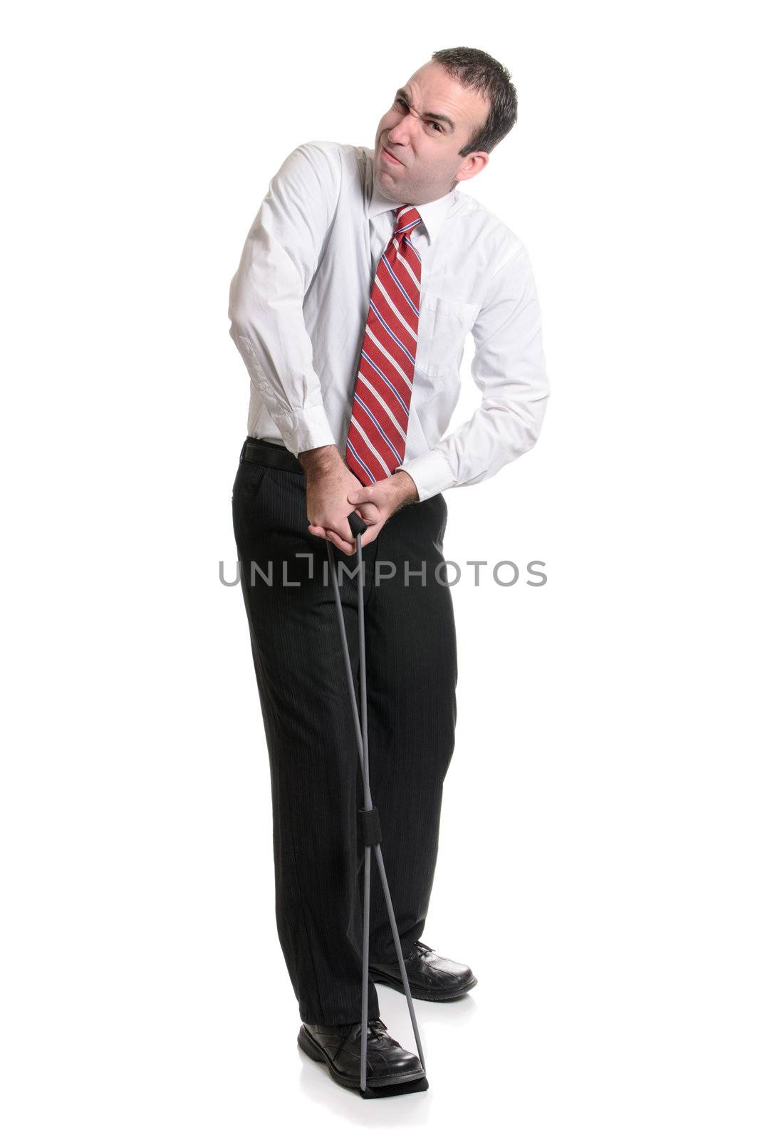 A weak businessman is working hard at doing his exercises to get fit, isolated against a white background.