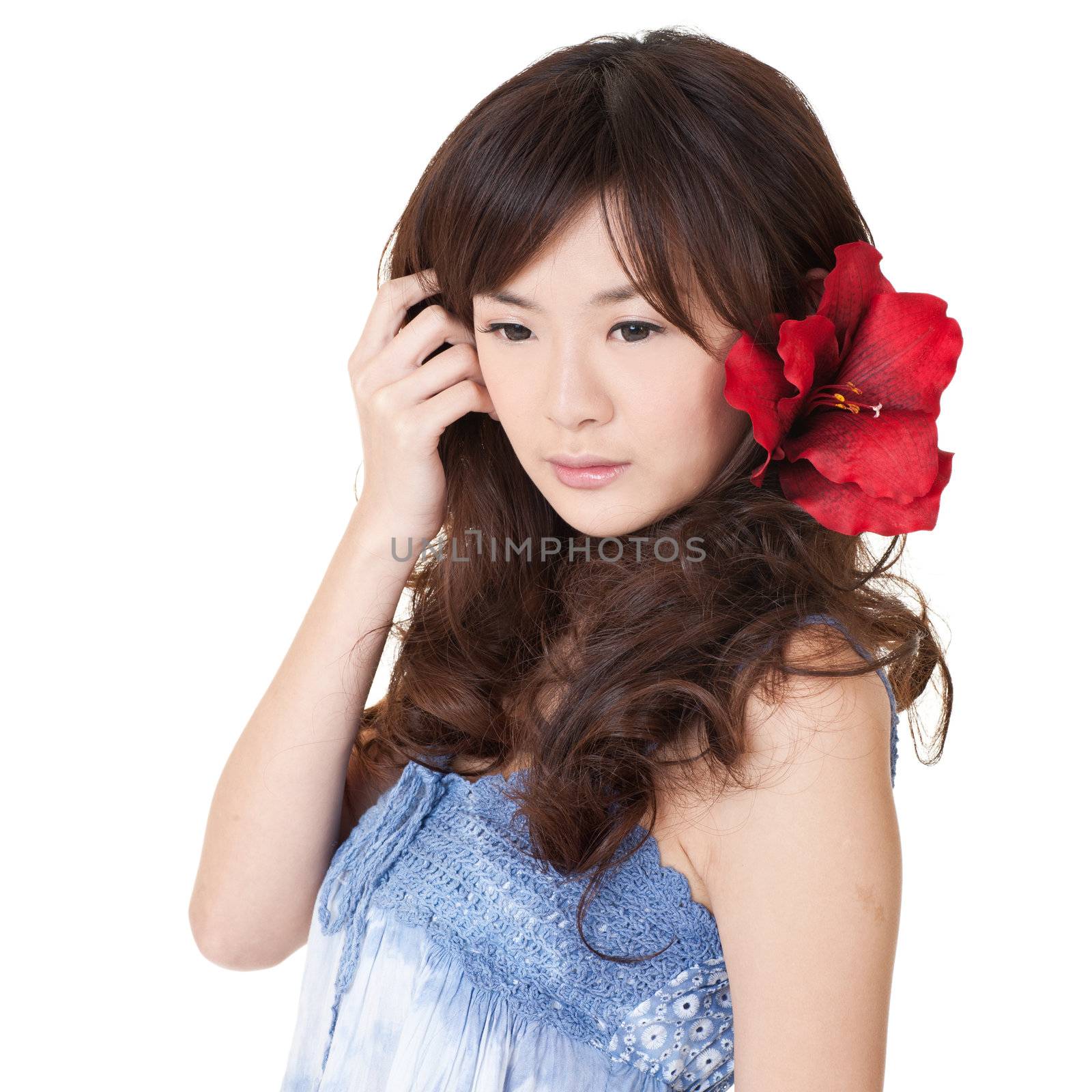 Attractive Asian beauty with lonely expression on white background.