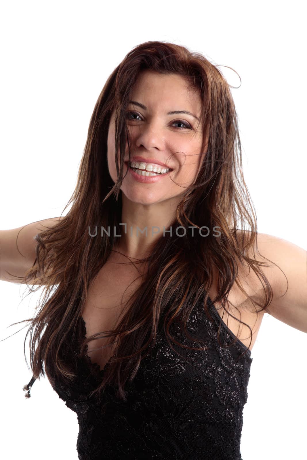 Beautiful vivacious carefree woman smiling and looking feeling fabulous.  White background.