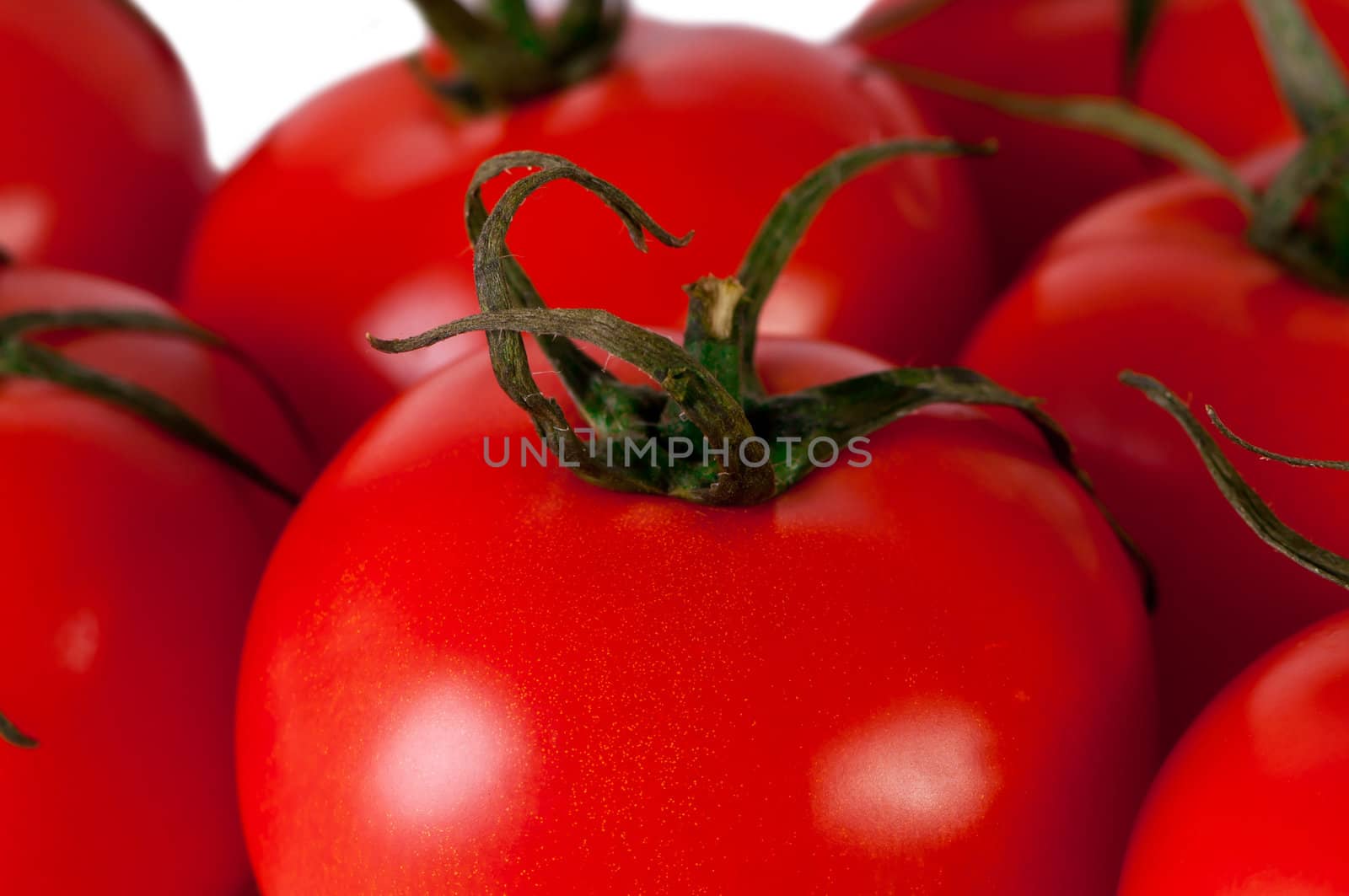 Red tomato isolated on white. Fresh red tomato. Sweet  vegetable.