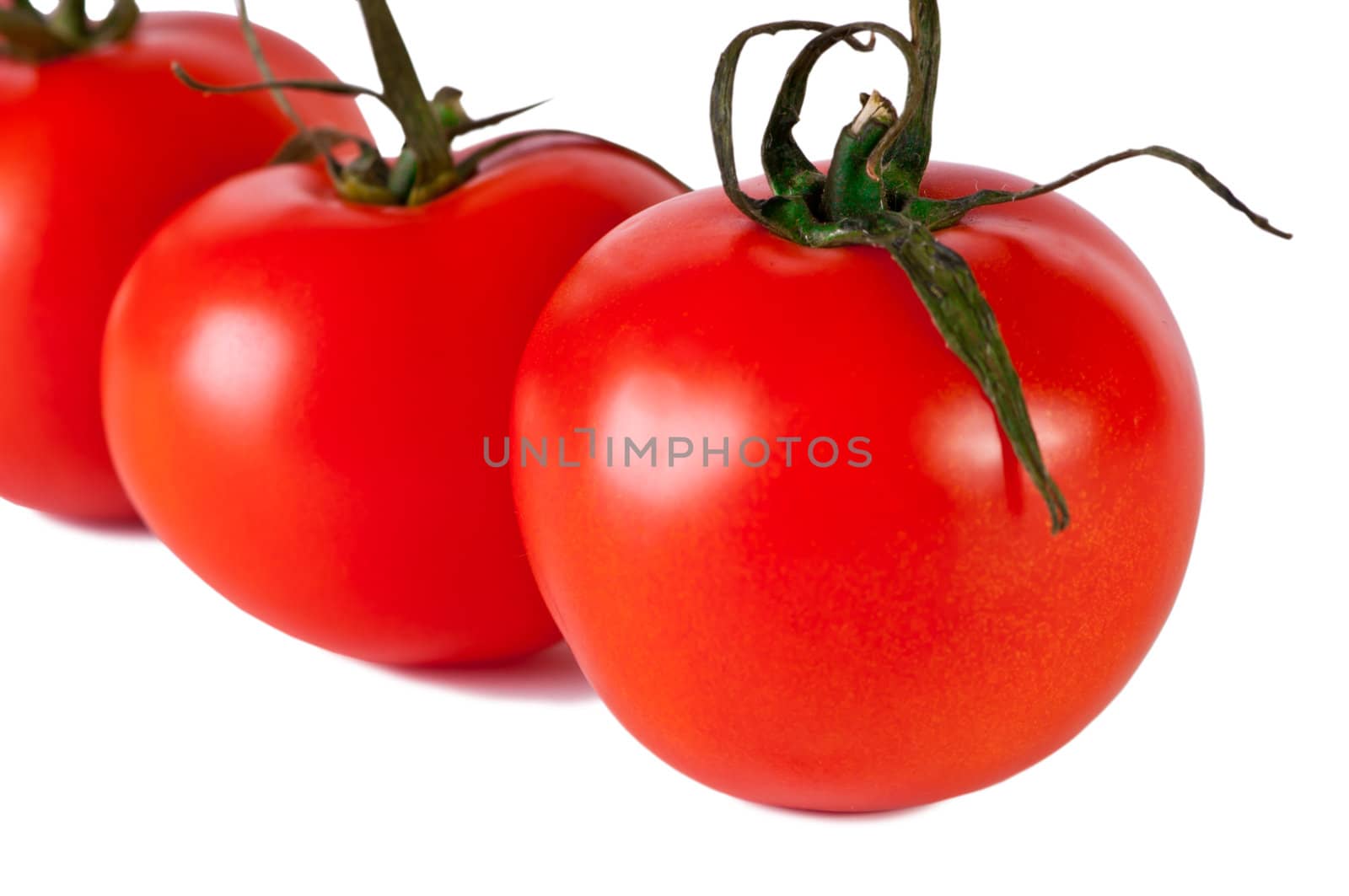 Red tomato isolated on white. Fresh red tomato. Sweet  vegetable.