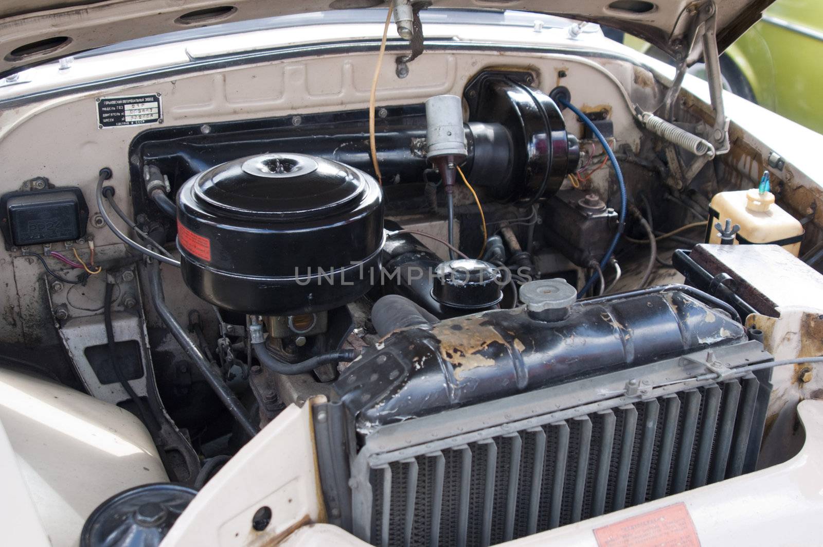 High resolution image. The engine bay of a classic muscle car.