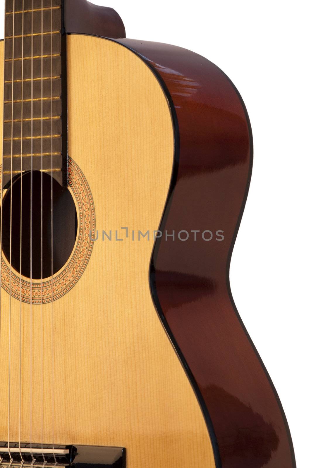 High resolution image.  Classical acoustic guitar, isolated on grey background.