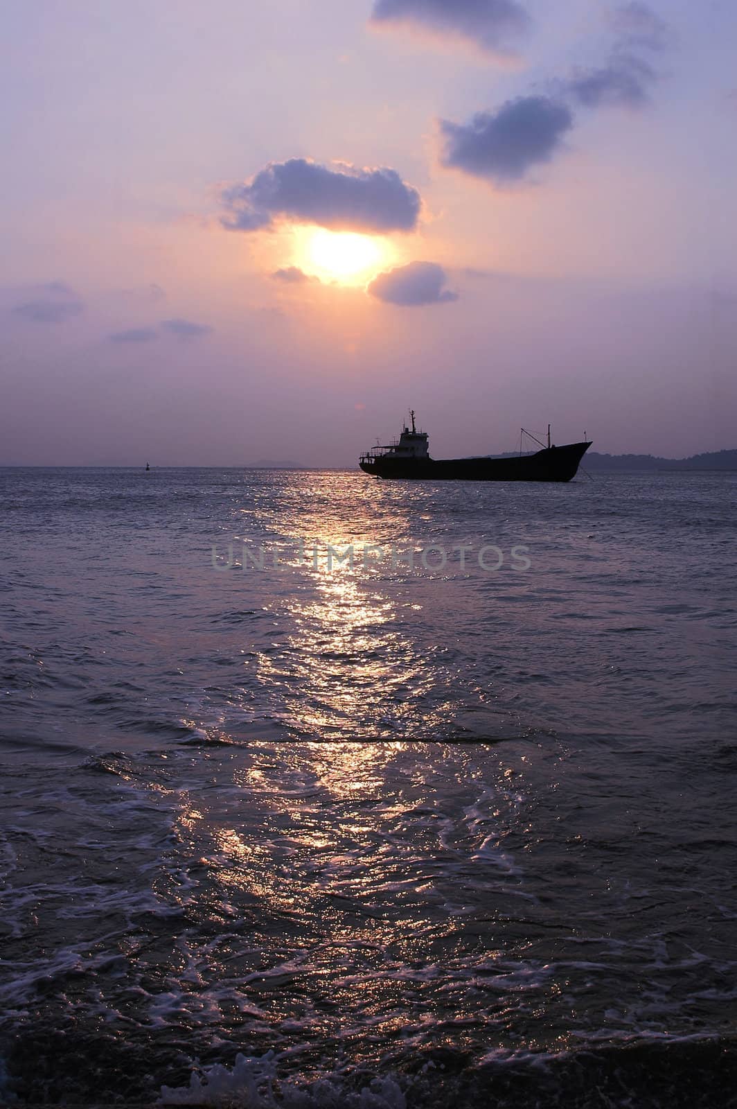 Scenery of ship in the sea at dusk