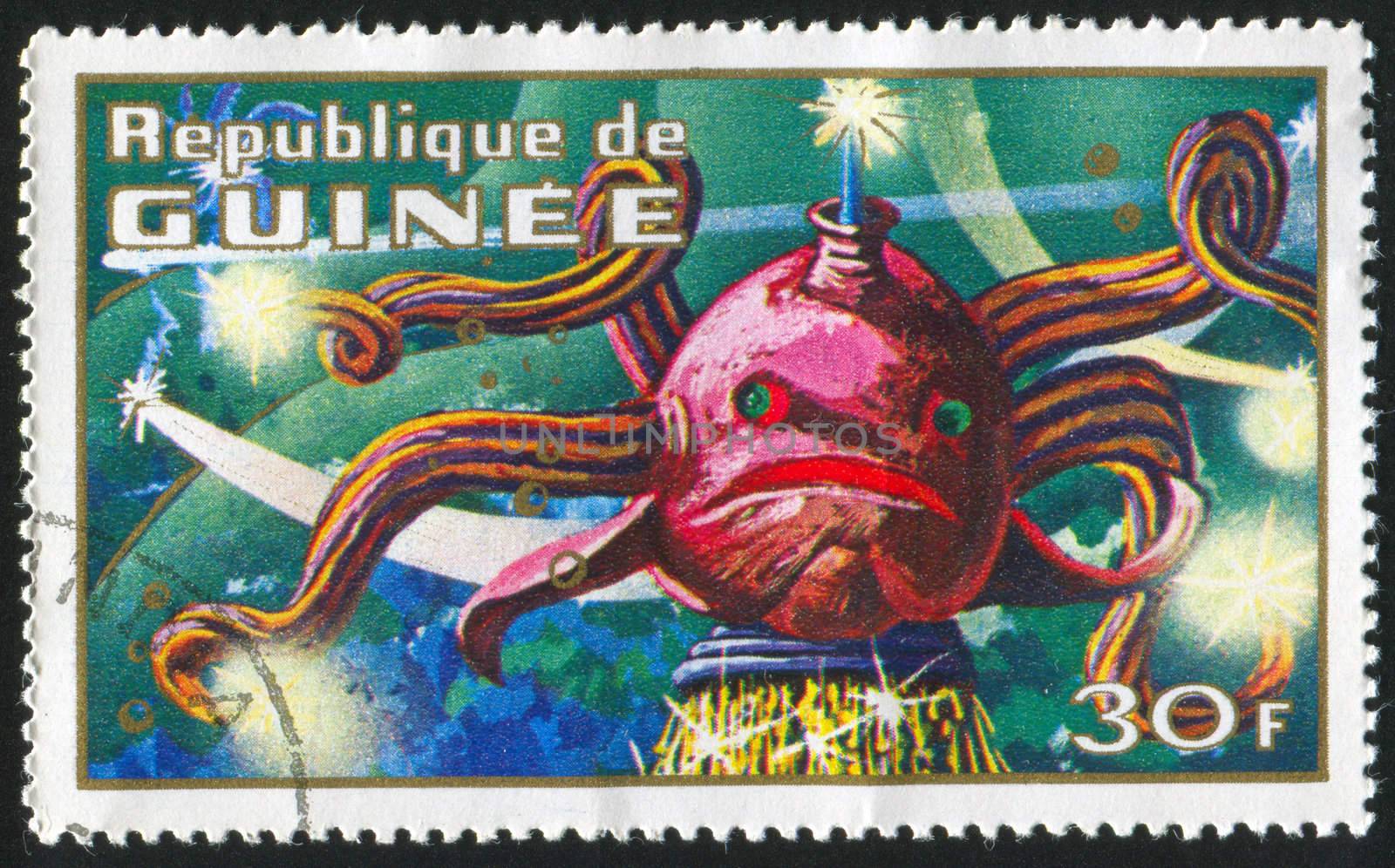 GUINEA - CIRCA 1972: stamp printed by Guinea, shows various imaginary prehistoric space creatures, circa 1972