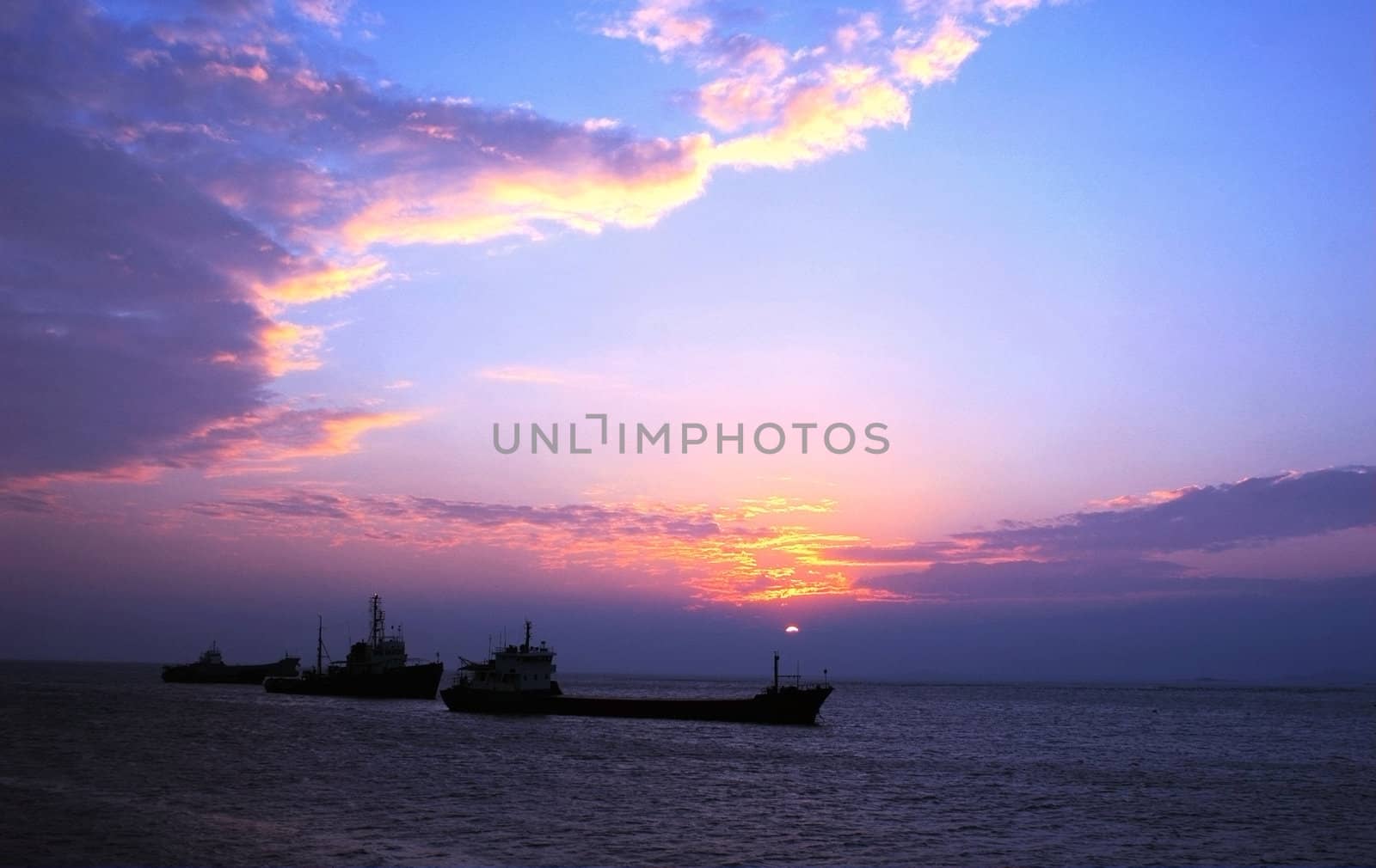 Scenery of ship in the sea at dusk