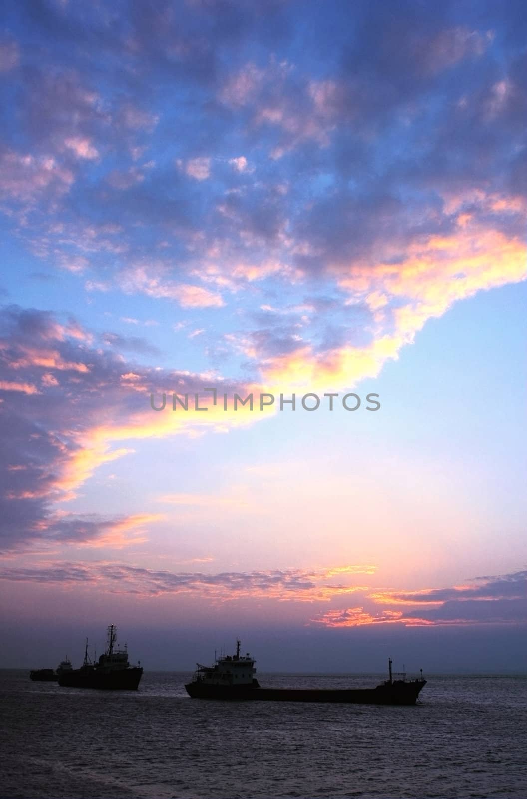 Scenery of ship in the sea at dusk